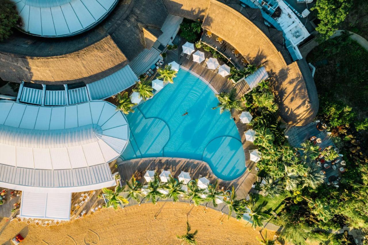 Lux* Grand Gaube Resort & Villas Exterior photo Aerial view of the pool
