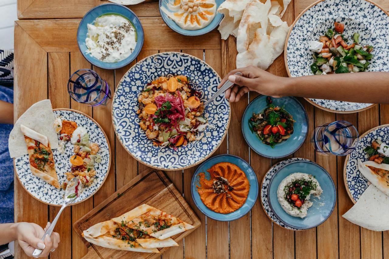 Lux* Grand Gaube Resort & Villas Exterior photo A selection of Turkish cuisine