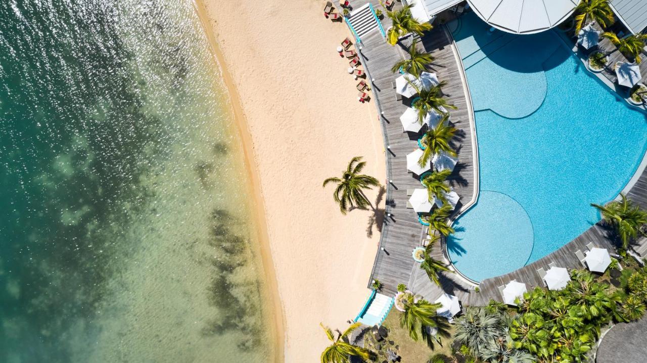 Lux* Grand Gaube Resort & Villas Exterior photo Aerial view of the pool and beach at the Sheraton Maldives Resort & Spa