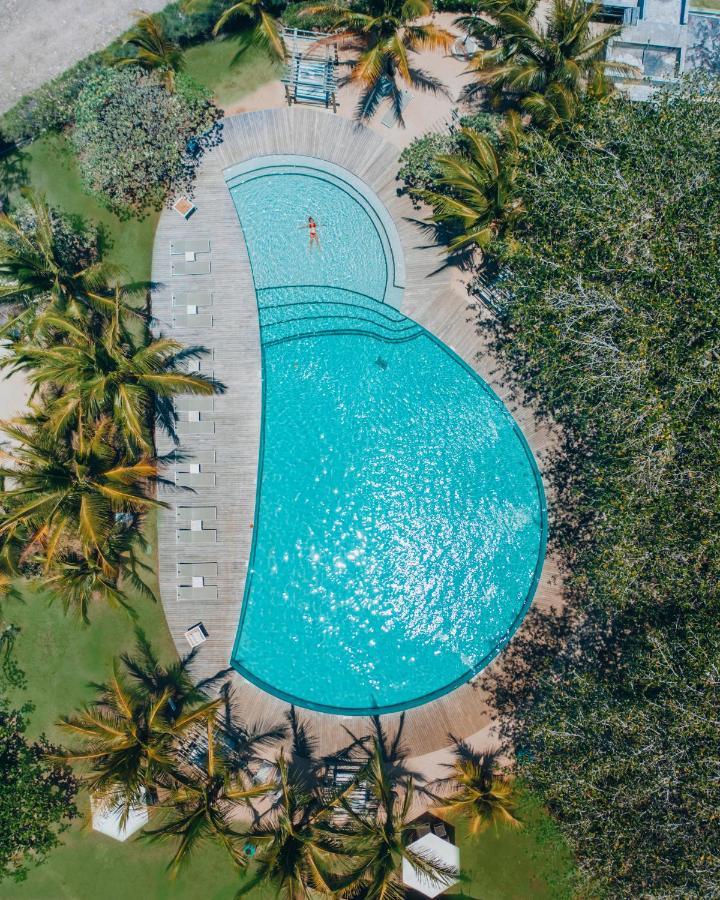 Lux* Grand Gaube Resort & Villas Exterior photo Aerial view of the pool at the 2019 World Championships
