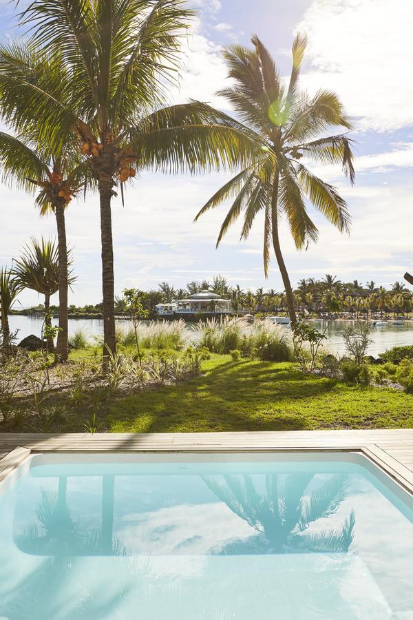 Lux* Grand Gaube Resort & Villas Exterior photo View of the lagoon from the hotel