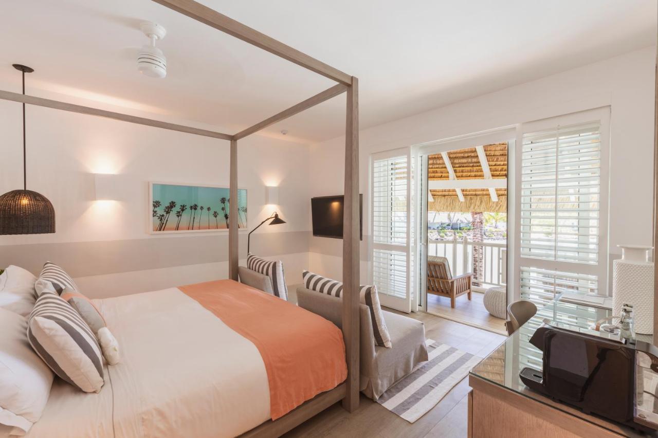 Lux* Grand Gaube Resort & Villas Exterior photo A bedroom at the Shore Club